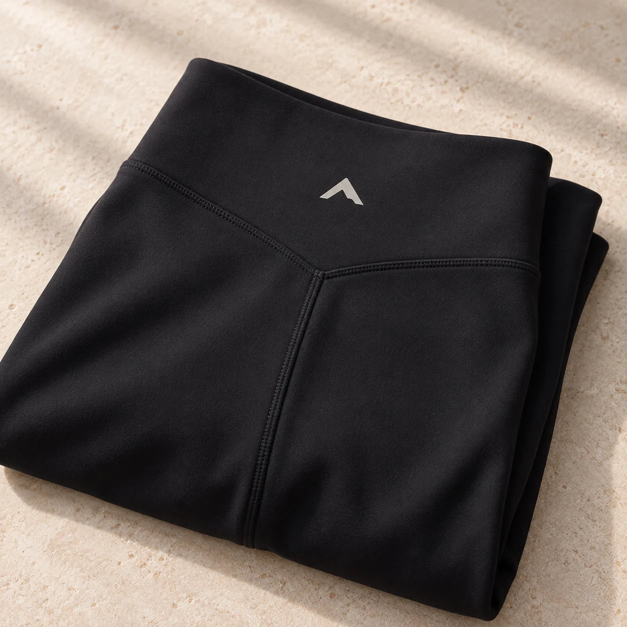 Velora fabric detail with the Camporian waistband logo